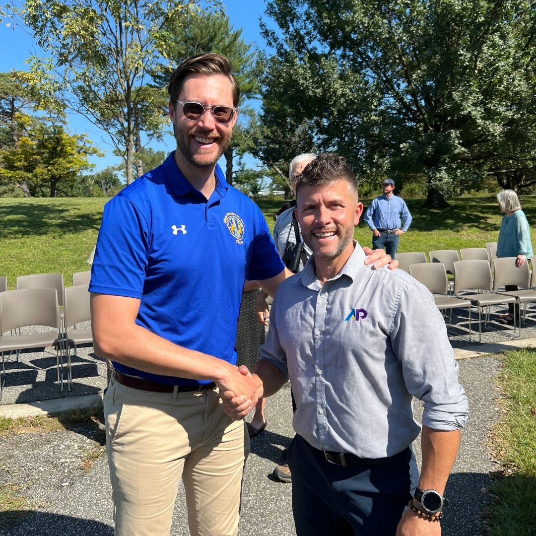 AP Corp CEO and Baltimore Deputy Chief of Staff Celebrate Bird Safety Window Film Success AP Corp CEO Bill Valway and Baltimore Deputy Chief of Staff J.D. Merrill shaking hands at the Cylburn Arboretum bird safety window film ribbon cutting ceremony