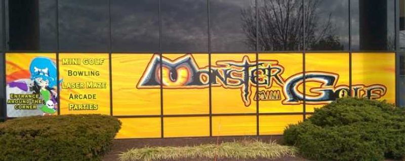 absolute-perfection-storefront-graphics-monster-mini-golf