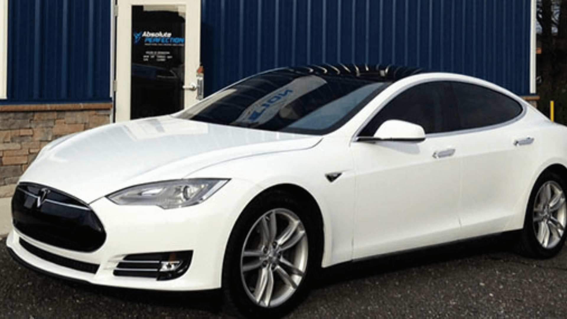 white tesla with tint