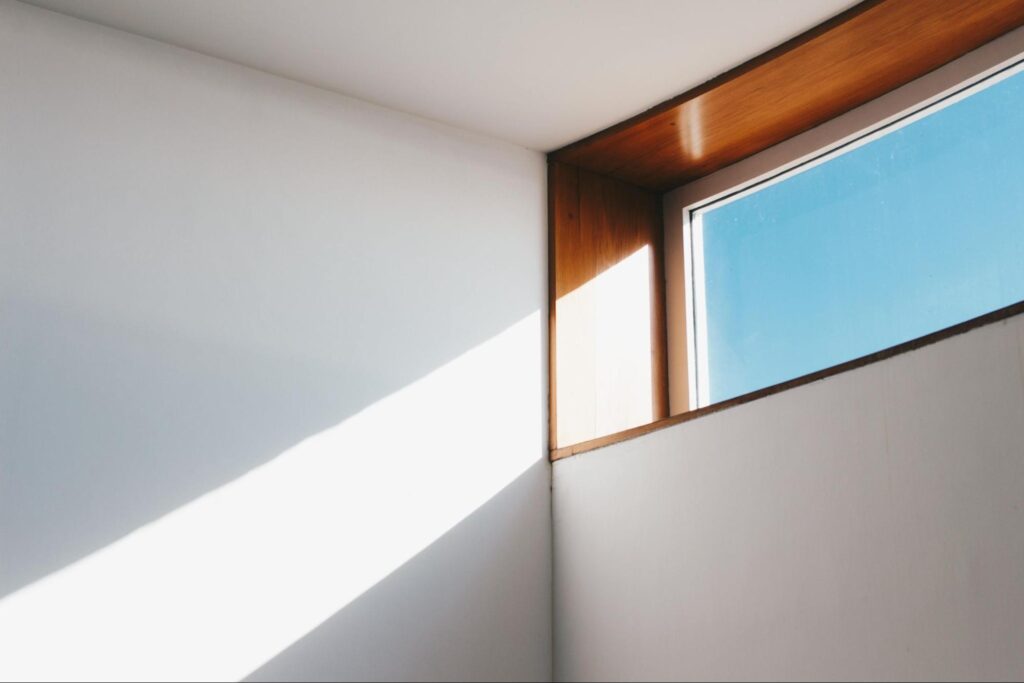 Small Window with Light Streaming in