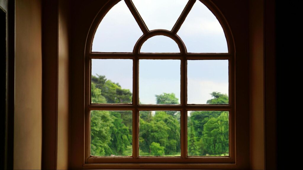 Arched Window Looking Out at Trees