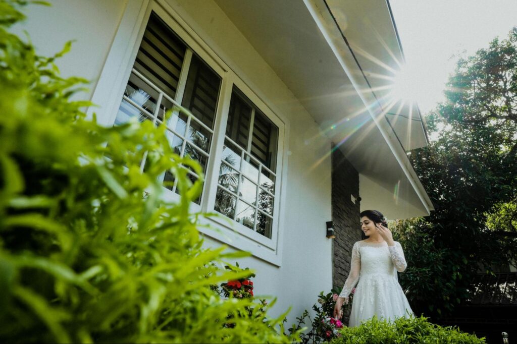 Woman Standing Outside of Window