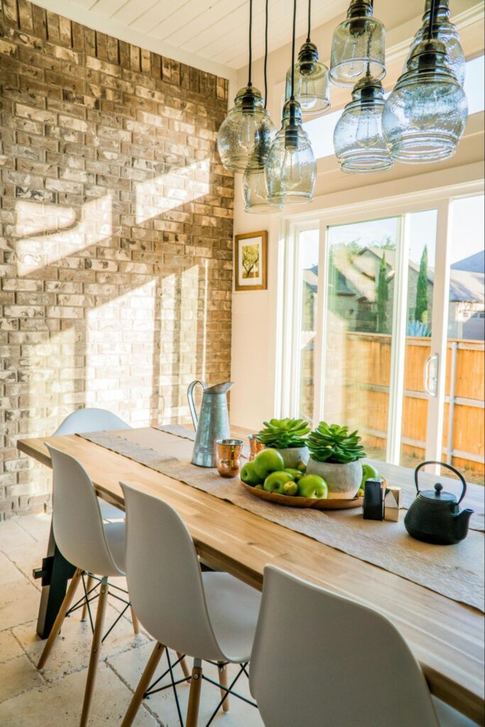 Dining Table with Fruit, Plants, and Pitchers