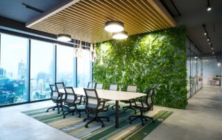 A modern workspace with smart lighting and modern design features that help conserve energy in the office.